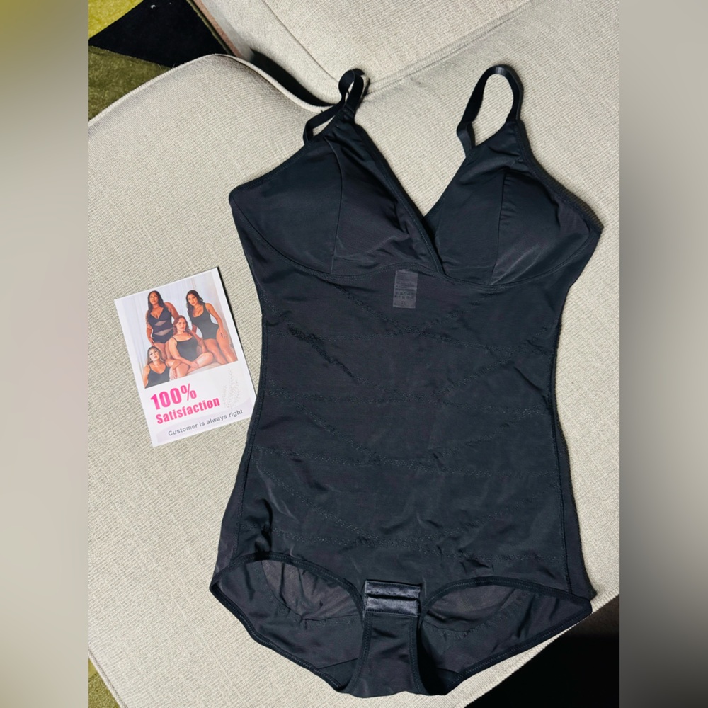 Never worn brief body suit